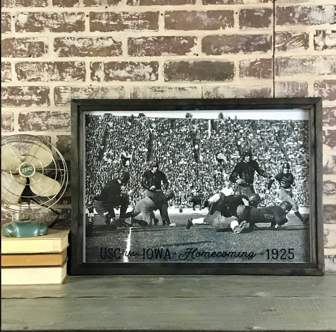 Framed reproduction photo of the 1925 USC vs. Iowa football game, sold at Thistles in Pella, Iowa