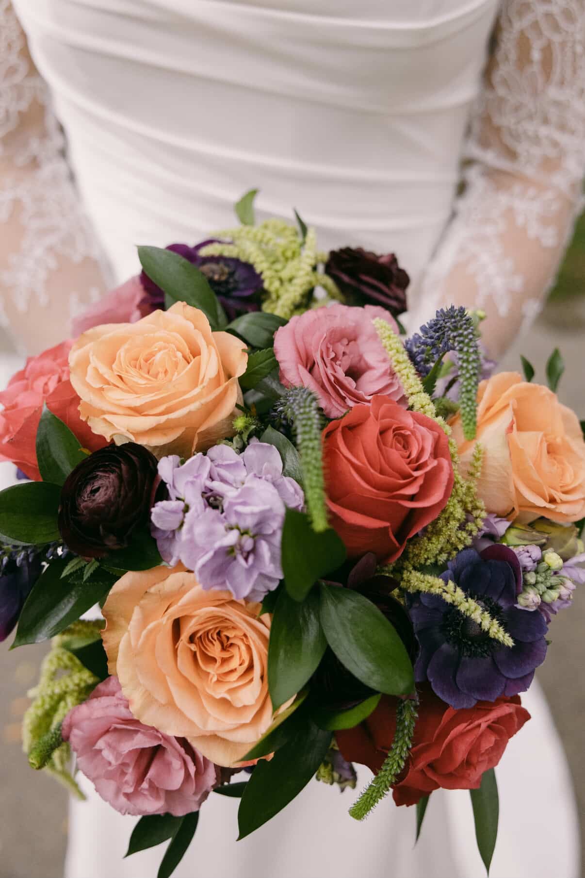 Pink, purple, orange, and green bridal bouquet, Des Moines, Iowa