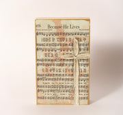 Hand-painted wooden hymn and cross block, 6 by 9 inches, sold at Thistles in Pella, Iowa