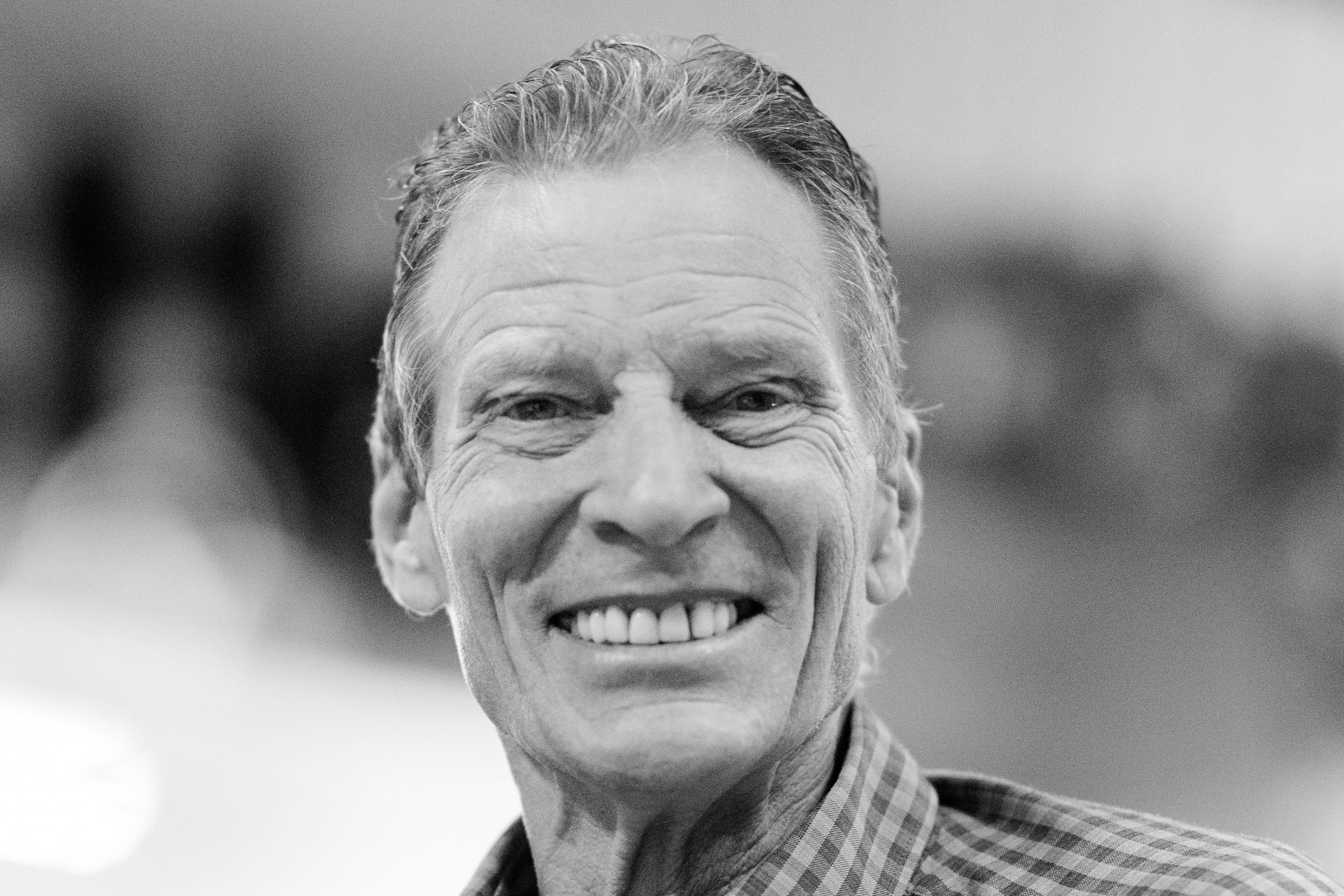 Black and white photo of a craftsman who builds custom furniture in Pella, Iowa