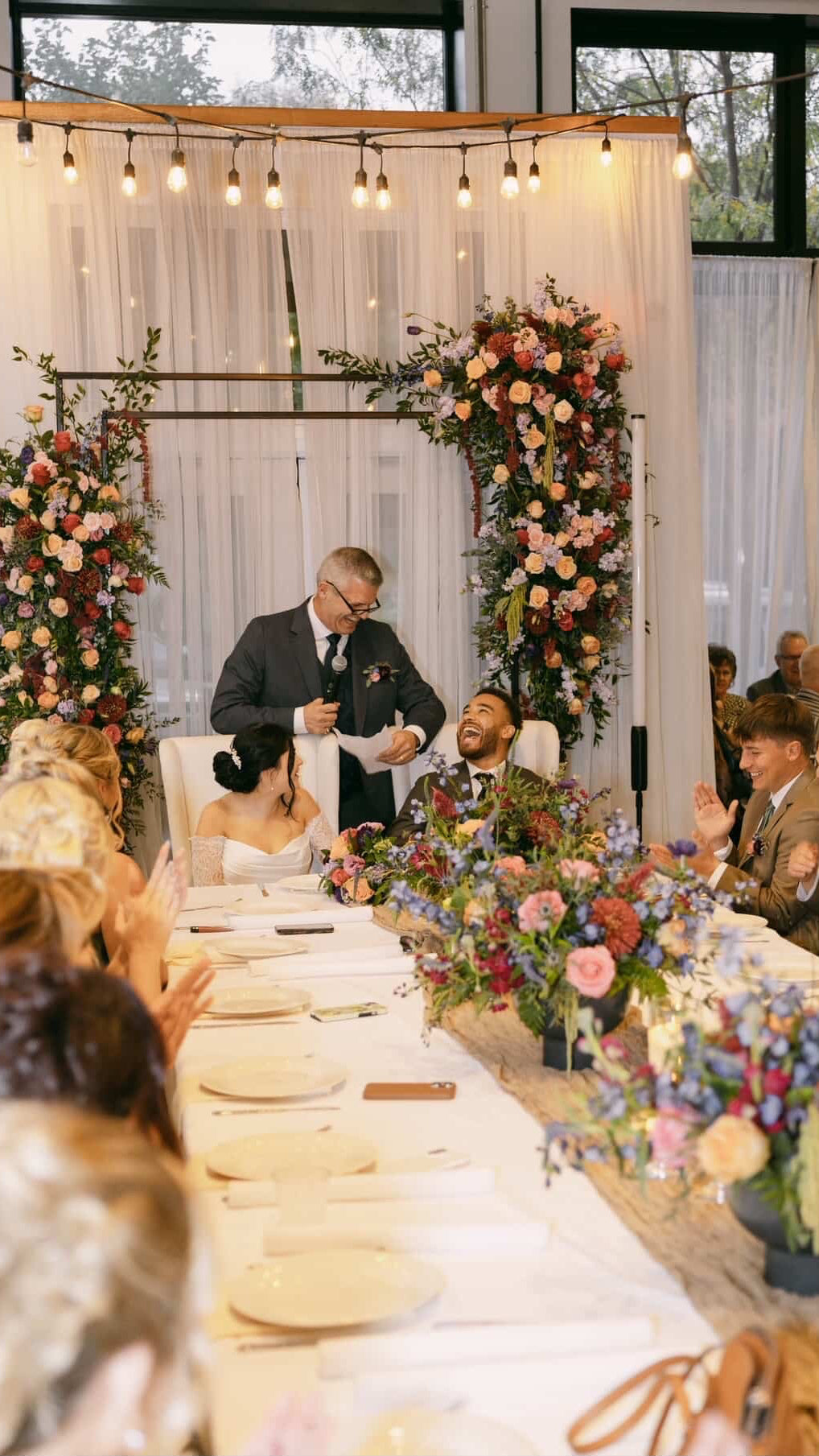 Wedding reception floral arch at Bash, Des Moines, Iowa