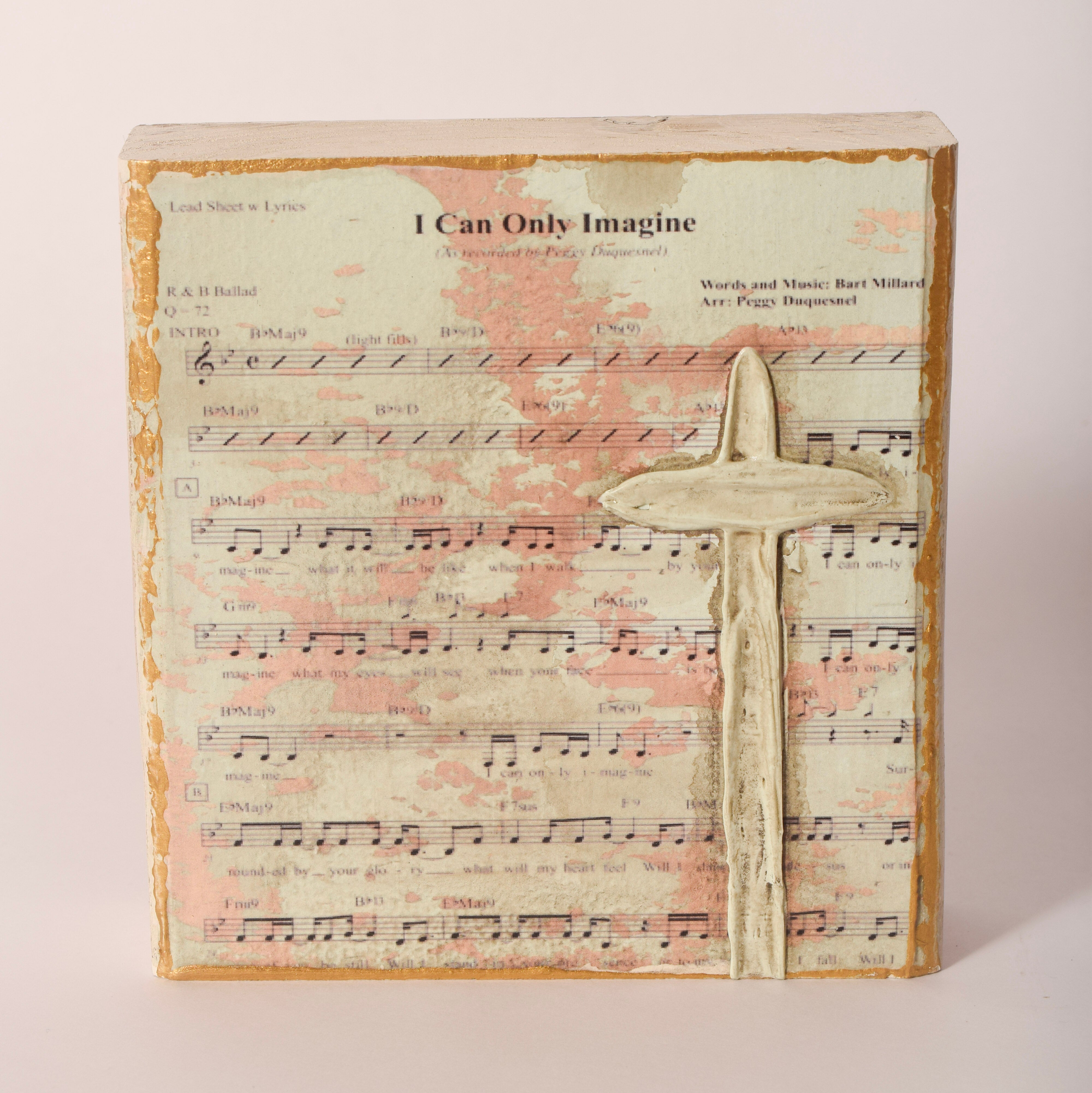 Hand-painted wooden hymn and cross block, 6 by 6 inches, sold at Thistles in Pella, Iowa